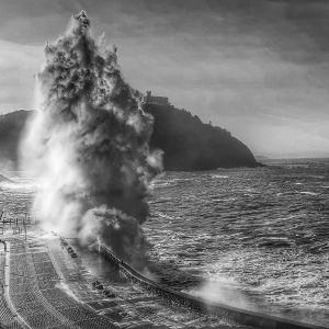 a pile of steam coming out of the ocean at Olatu Haundia Donostian in San Sebastián