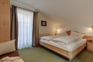 Letto o letti in una camera di Ferienwohnungen Johanneshof