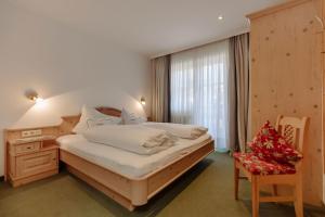 Letto o letti in una camera di Ferienwohnungen Johanneshof