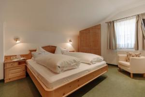 Letto o letti in una camera di Ferienwohnungen Johanneshof