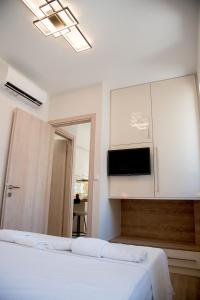 A television and/or entertainment centre at Chrysanthi's Apartment