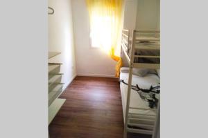Posteľ alebo postele v izbe v ubytovaní Apartamento recién reformado en primera línea con vistas a la playa de la Almadraba