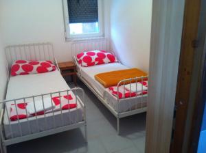 Posteľ alebo postele v izbe v ubytovaní Apartments Frog Creek
