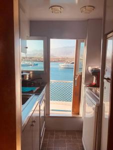 A kitchen or kitchenette at Wonderful yatch to rent at Tenerif south