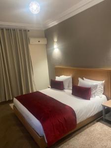 Postel nebo postele na pokoji v ubytování Golden Beach Appart'hotel