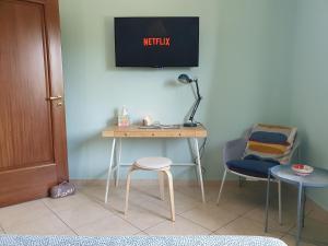 TV a/nebo společenská místnost v ubytování Home 123