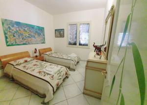 Postel nebo postele na pokoji v ubytování CASA ARTE