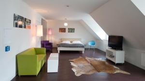 Telewizja i/lub zestaw kina domowego w obiekcie Stanys - Das Apartmenthotel