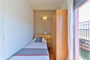 Postel nebo postele na pokoji v ubytování Hostal Alberana
