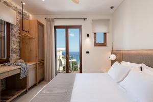 Posteľ alebo postele v izbe v ubytovaní The Authentic Village Boutique Hotel
