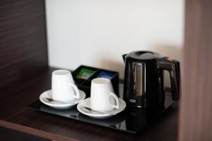 Принадлежности для чая и кофе в Hotel Cristal Setúbal