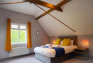Ένα ή περισσότερα κρεβάτια σε δωμάτιο στο The Strutt Arms
