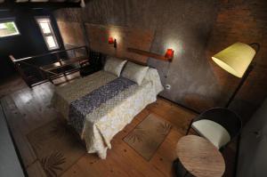 En eller flere senge i et værelse på Pura vida