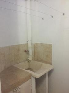 a bathroom with a sink in a room at Casa Bella-suit in Ciudadela Costa de Oro +10 photos