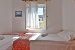 Postel nebo postele na pokoji v ubytování Options House