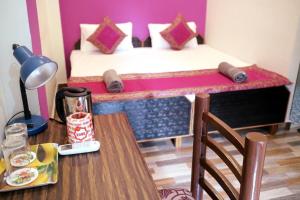 Postel nebo postele na pokoji v ubytování RELAX PAYING GUEST HOUSE