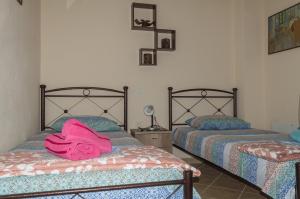 Postel nebo postele na pokoji v ubytování Family resort in Nea Vrasna