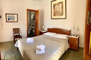 Letto o letti in una camera di Antheia