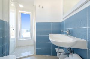 Koupelna v ubytování Smart Hotel Ugento + 37 fotografií