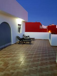 Uma varanda ou terraço em luxe appartement Nour D'asilah 3 Free WiFi 5G