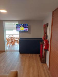A television and/or entertainment centre at Mirador Puerto