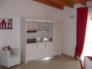 Kuchyň nebo kuchyňský kout v ubytování Residence Candeloro