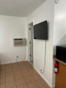 TV i/ili multimedijalni sistem u objektu Motel Safreen
