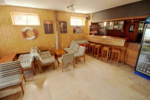 Lounge nebo bar v ubytování Aquilo Hotel Panoráma