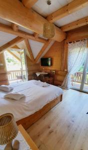 Postel nebo postele na pokoji v ubytování Chalet le Dorf