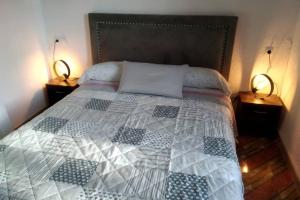 Ein Bett oder Betten in einem Zimmer der Unterkunft Casa Ani
