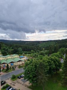 an aerial view of a gas station and a parking lot at Bergstation Altenau in Altenau