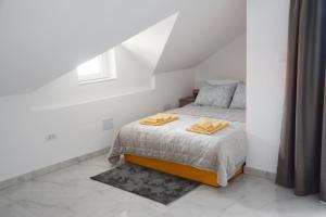 Кровать или кровати в номере Villa Bella