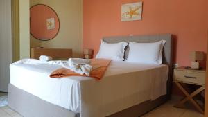 Een bed of bedden in een kamer bij Bayside Apartments