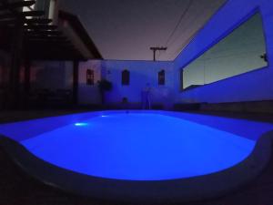 Bazén v ubytování Casa com Piscina e Churrasqueira e excelente Localização em Piuma nebo v jeho okolí