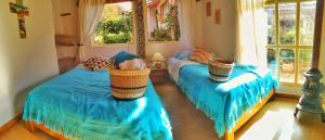 Ένα ή περισσότερα κρεβάτια σε δωμάτιο στο MACANI eco-glam