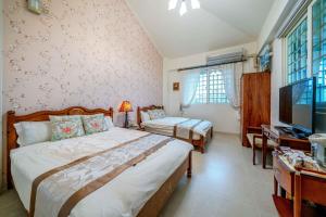 Krevet ili kreveti u jedinici u okviru objekta Evergreen Garden House