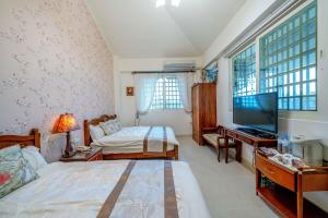Krevet ili kreveti u jedinici u okviru objekta Evergreen Garden House