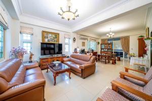 Prostor za sedenje u objektu Evergreen Garden House