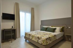 Ένα ή περισσότερα κρεβάτια σε δωμάτιο στο Casa Salemi - Western Sicily Home
