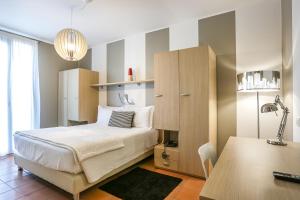 מיטה או מיטות בחדר ב-Residenza Cartiera 243 Country House