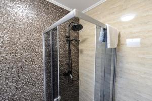 Koupelna v ubytování Toma Residence