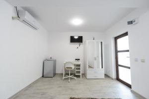 TV a/nebo společenská místnost v ubytování Toma Residence