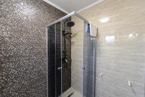 Koupelna v ubytování Toma Residence