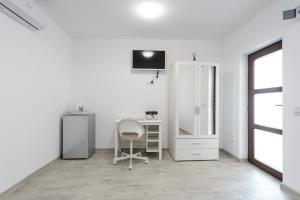 TV a/nebo společenská místnost v ubytování Toma Residence