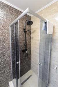 Koupelna v ubytování Toma Residence