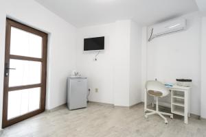 TV a/nebo společenská místnost v ubytování Toma Residence