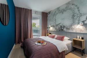 Ένα ή περισσότερα κρεβάτια σε δωμάτιο στο Barska 69 Apartments