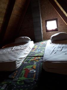 A bed or beds in a room at IMANJE JELEN