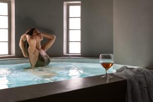 Goście zatrzymujący się w obiekcie Kaminos Boutique Hotel