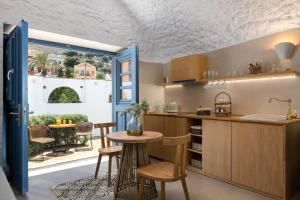 Kuchnia lub aneks kuchenny w obiekcie Kaminos Boutique Hotel